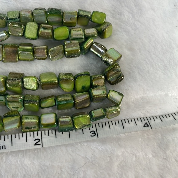 Three green spiny shell elastic bracelets. - Picture 2 of 3